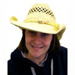 Natural woven western hat with rolled brim and decorative shell band.