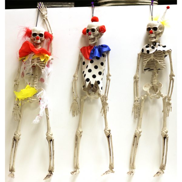 Plastic Hanging Clown Skeleton come in 3 different styles. They are made of hard plastic. Jointed at the jaw, shoulders and hips and measure 16" x 3".