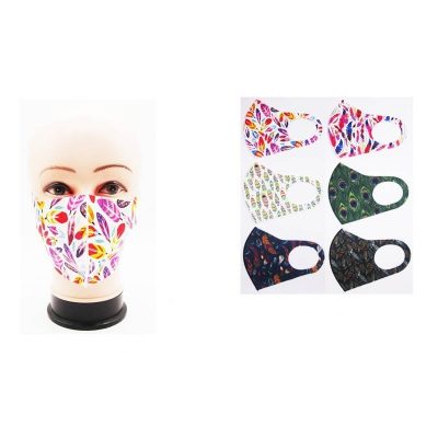 Assorted colorful feather print face masks with bright artistic patterns.