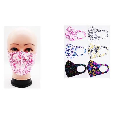Assorted colorful butterfly face masks with bright printed butterfly patterns.