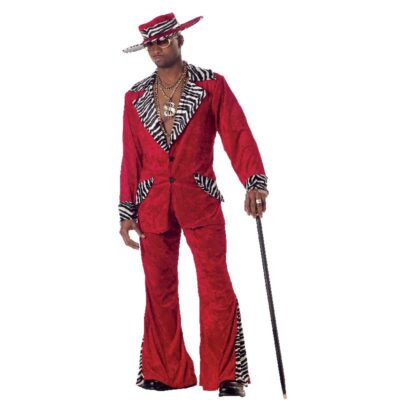 Adult wearing a red pimp costume with a velvet-look zebra-trimmed jacket, matching flared pants, coordinating hat, sunglasses, jewelry, and cane.