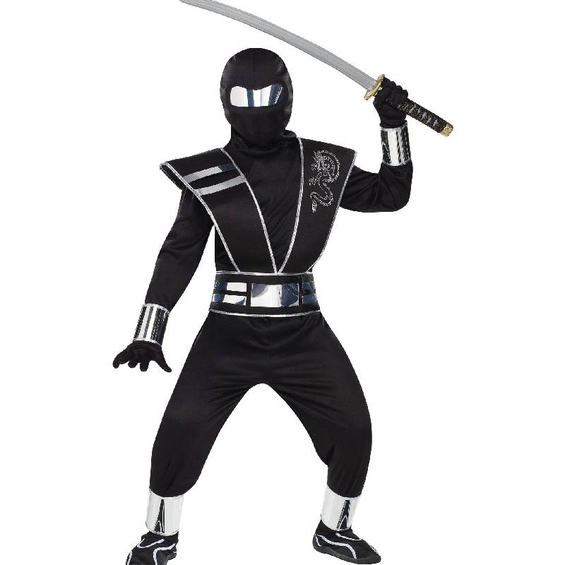 Person wearing a Black Dragon Ninja Costume with a hooded face mask, silver dragon emblem, reflective belt, wrist guards, and shin guards.