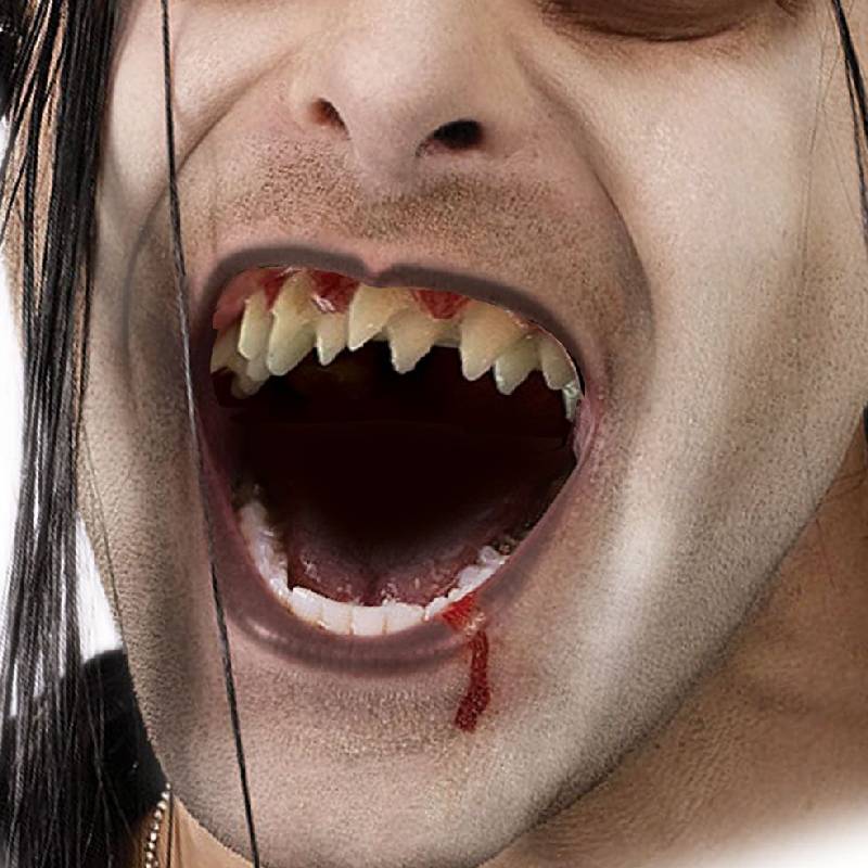 Double Row Vampire Fangs with multiple irregular ivory-colored pointed teeth worn with pale vampire makeup and fake blood.