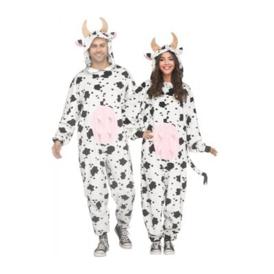 Two adults wearing black-and-white spotted cow costumes with hooded cow heads, tan horns, pink udders, and tails.