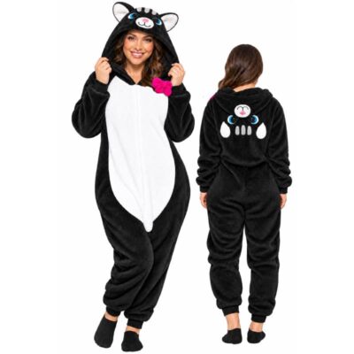 Black plush cat hooded onesie costume shown from front and back with white belly panel, cat ears, facial details, and pink bow accent.